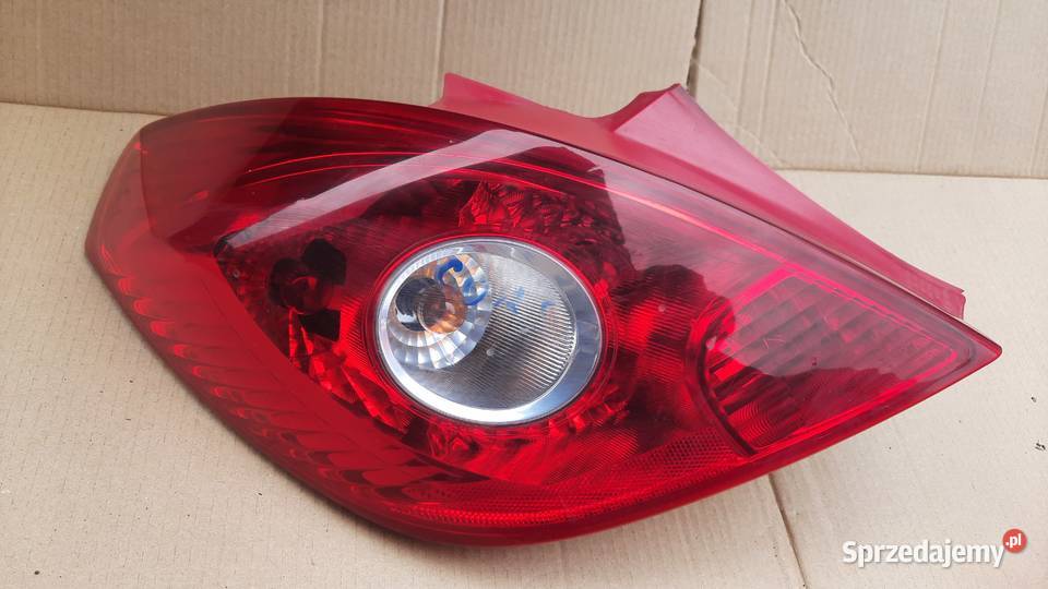 lampa tylna OPEL CORSA D 3 drzwi prawa 13186351 Lampy tylne Dębno