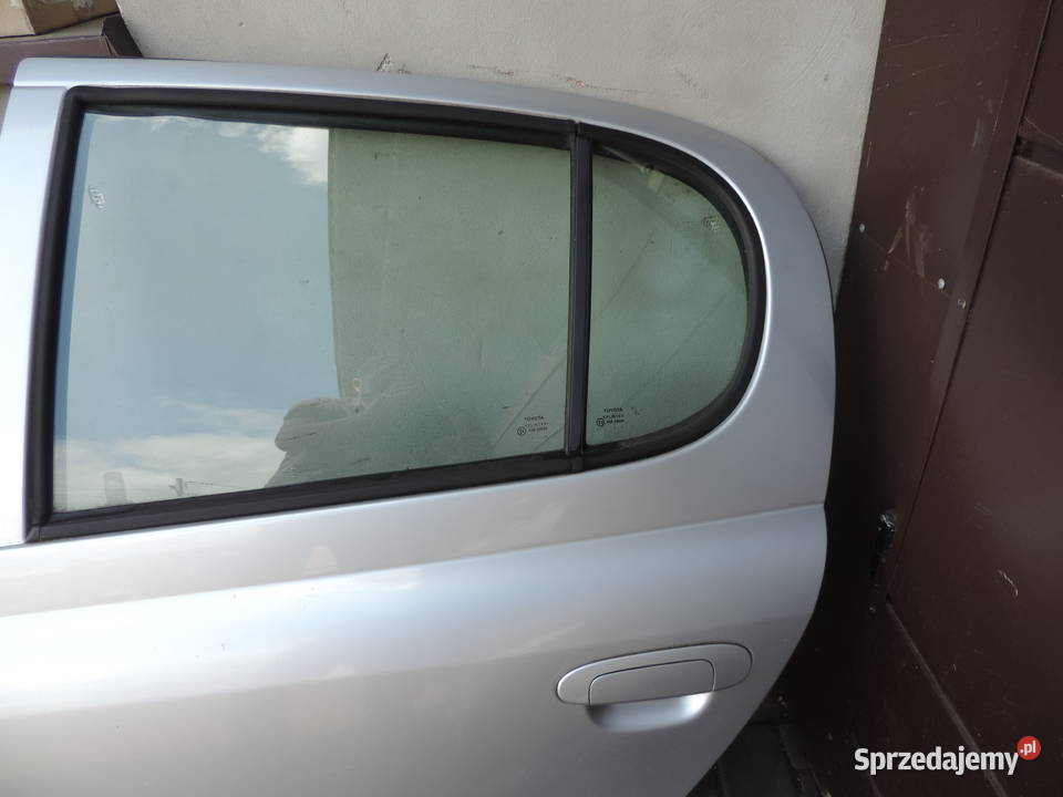 DRZWI TYLNE LEWE TOYOTA YARIS I HB FL 1E7 małopolskie Nowy Sącz