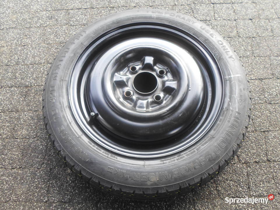 Koło dojazdowe Nissan 15 4x1143 4J T13580R15 Kamieniec