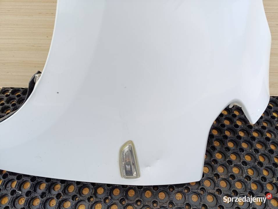 OPEL ASTRA J BŁOTNIK PRZÓD LEWY Y40R Zbierkowo