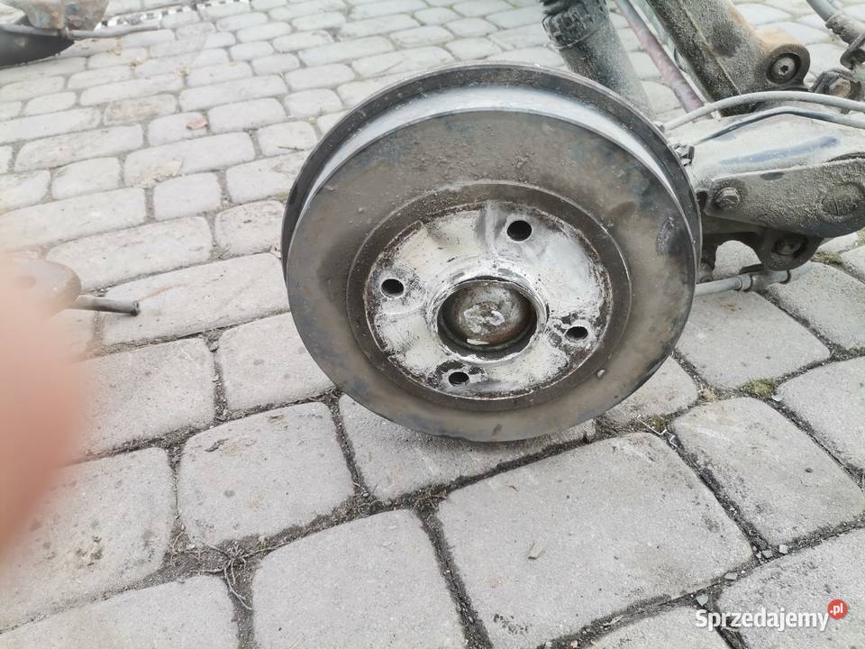 PEUGEOT 206 HB 5D BELKA OŚ ZAWIESZENIA TYŁ BĘBNY