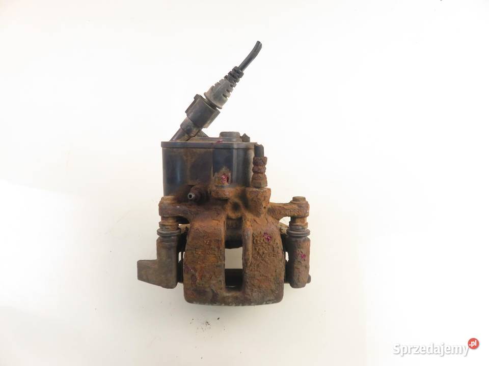 ZACISK LEWY TYŁ AUDI A6 C6 30 TDI quattro