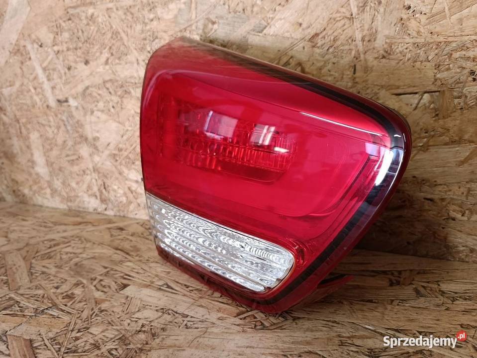 KIA CARENS IV LAMPA W KLAPĘ LEWY TYŁ 92403A4010 osobowe Pleszew