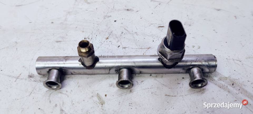 LISTWA WTRYSKOWA AUDI A4 A6 C6 32 FSI 06E13089B Przystajń
