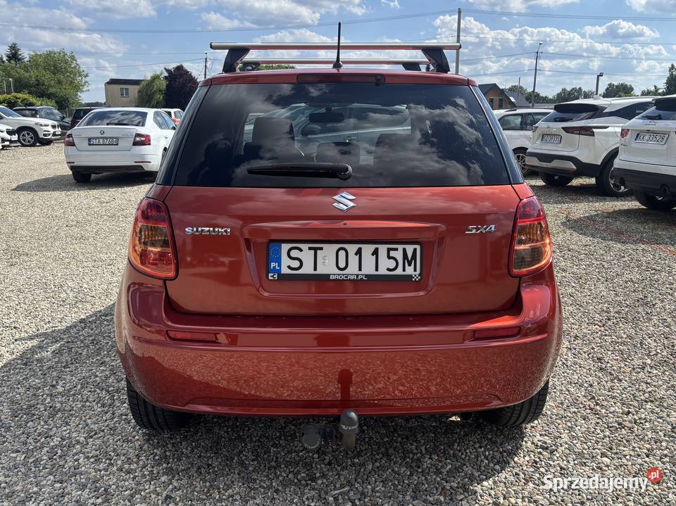 Suzuki SX4 pomarańczowy Paniówki