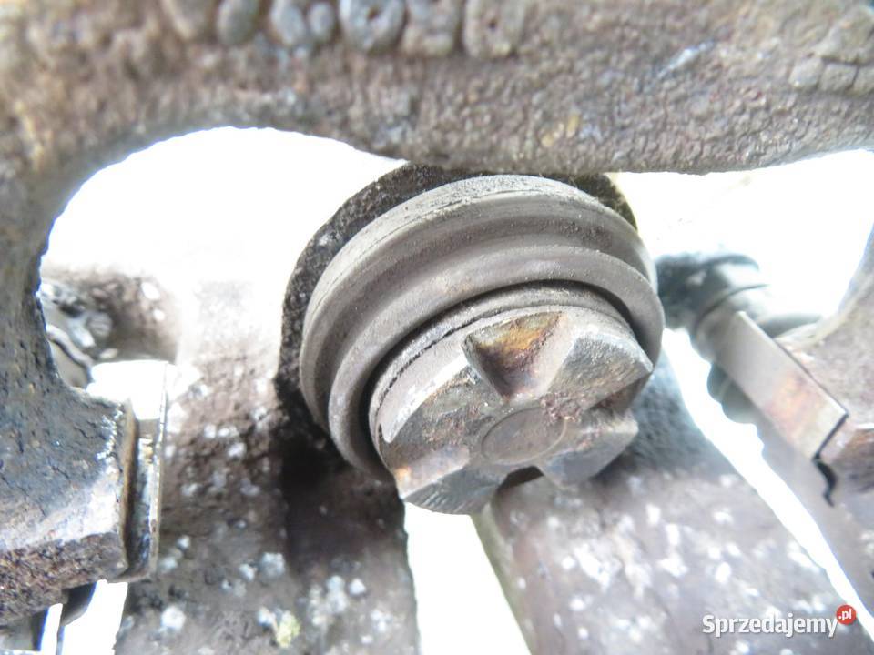 ZACISK LEWY TYŁ RENAULT MEGANE III 15 dCi