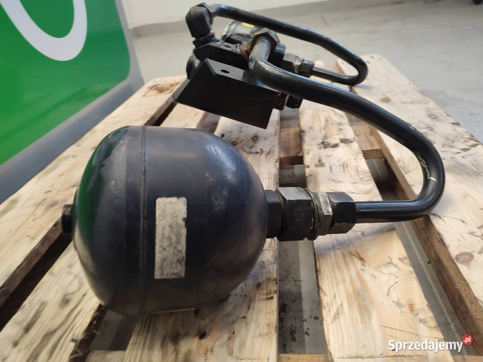 Amortyzacja przedniego tuza Case 370 Magnum