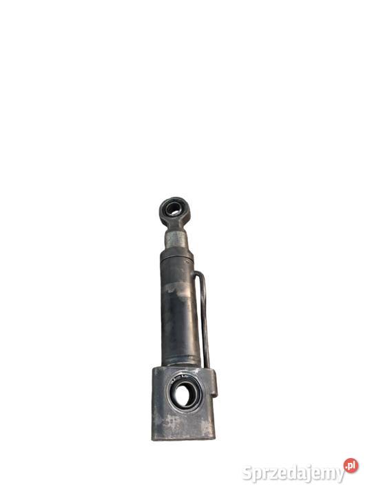 SIŁOWNIK AMORTYZACJI OSI 87648501 CASE PUMA 185