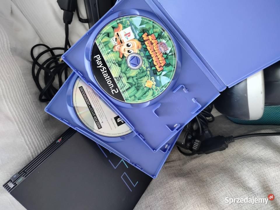 Konsola 2 z kierownicą i grami Sony Playstation 2 Busko-Zdrój