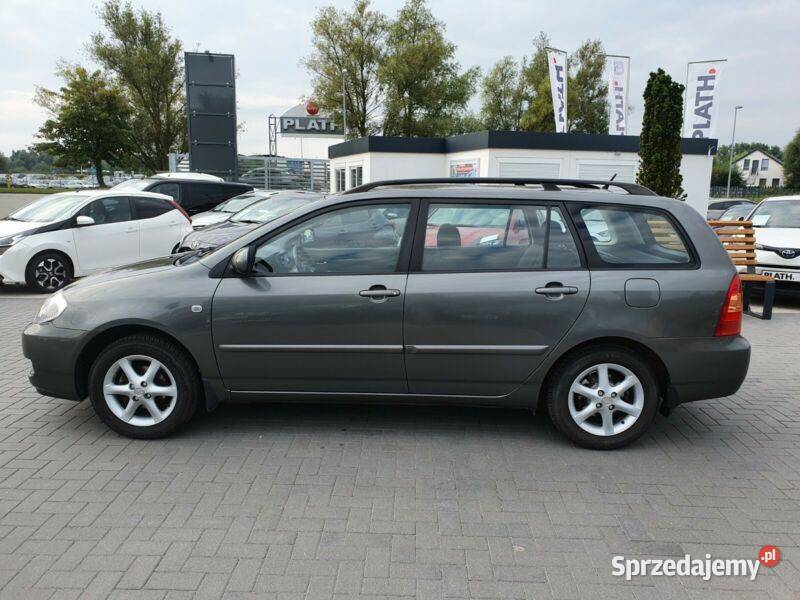 COROLLA E12 drzwi lewy przód czerwoną bez Tarnów