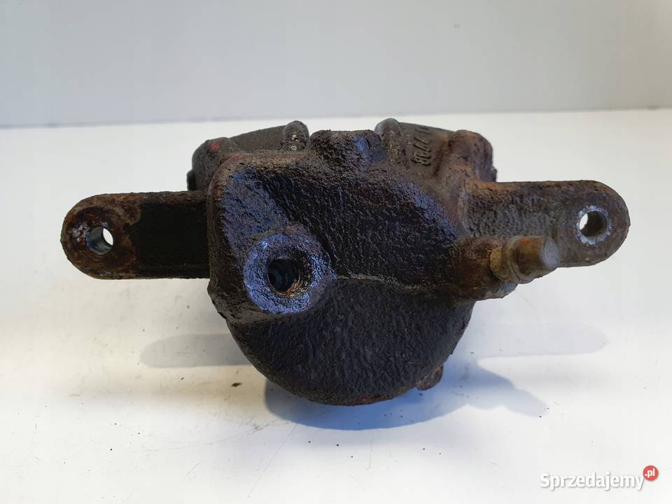 Dacia Lodgy PRZEDNI ZACISK HAMULCOWY prawy przód Rudka