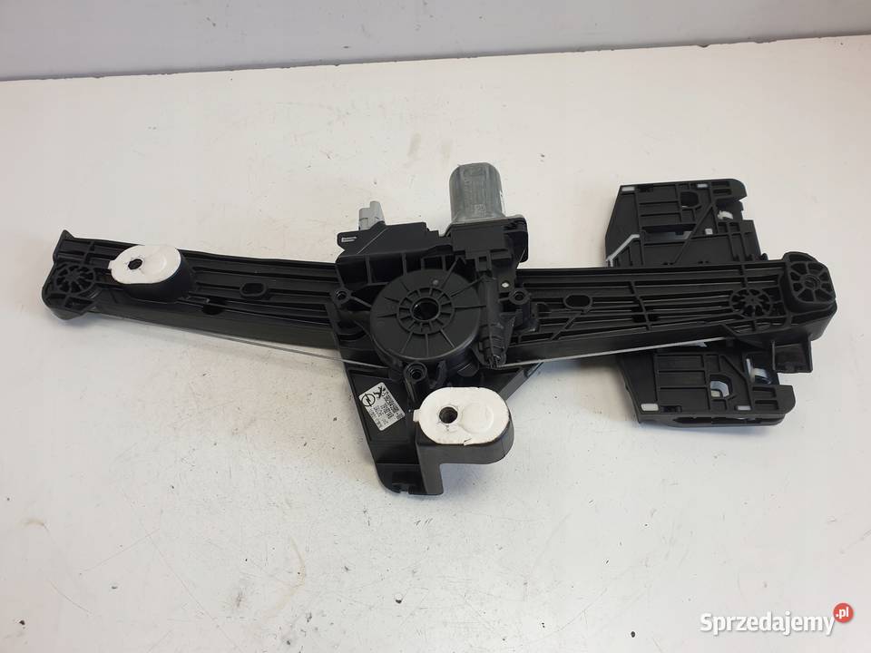 Opel Corsa F MCHANIZM PODOSZENIA SZYBY lewy tył Rudka