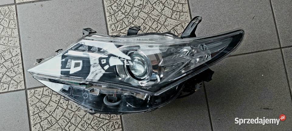 8115002e20 Toyota Auris lampa lewa 2013 2015 LED Byków
