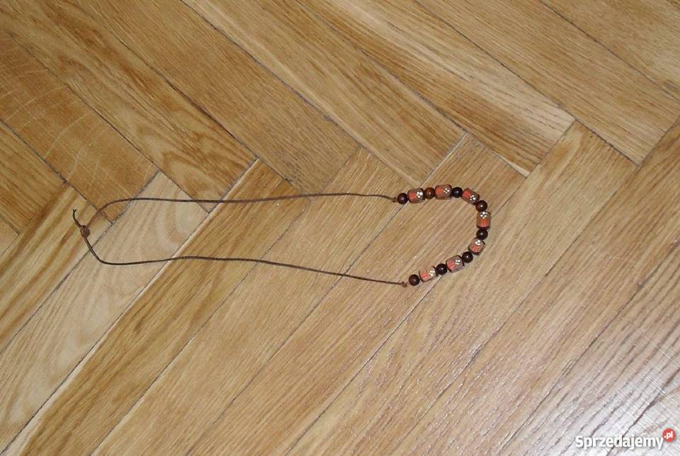 NASZYJNIK NA SKÓRZANYM RZEMYKU KOSTKI Łódź