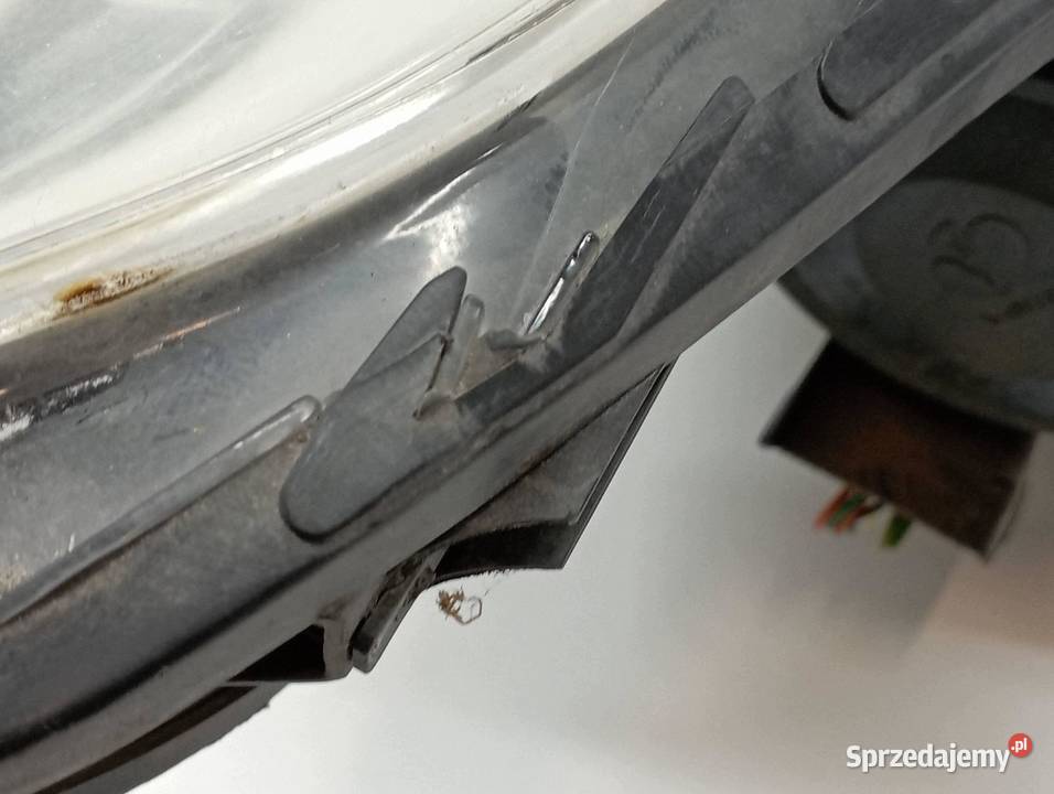 LAMPA PRZÓD LEWA XENON EUROPA 9806093180 Citroen