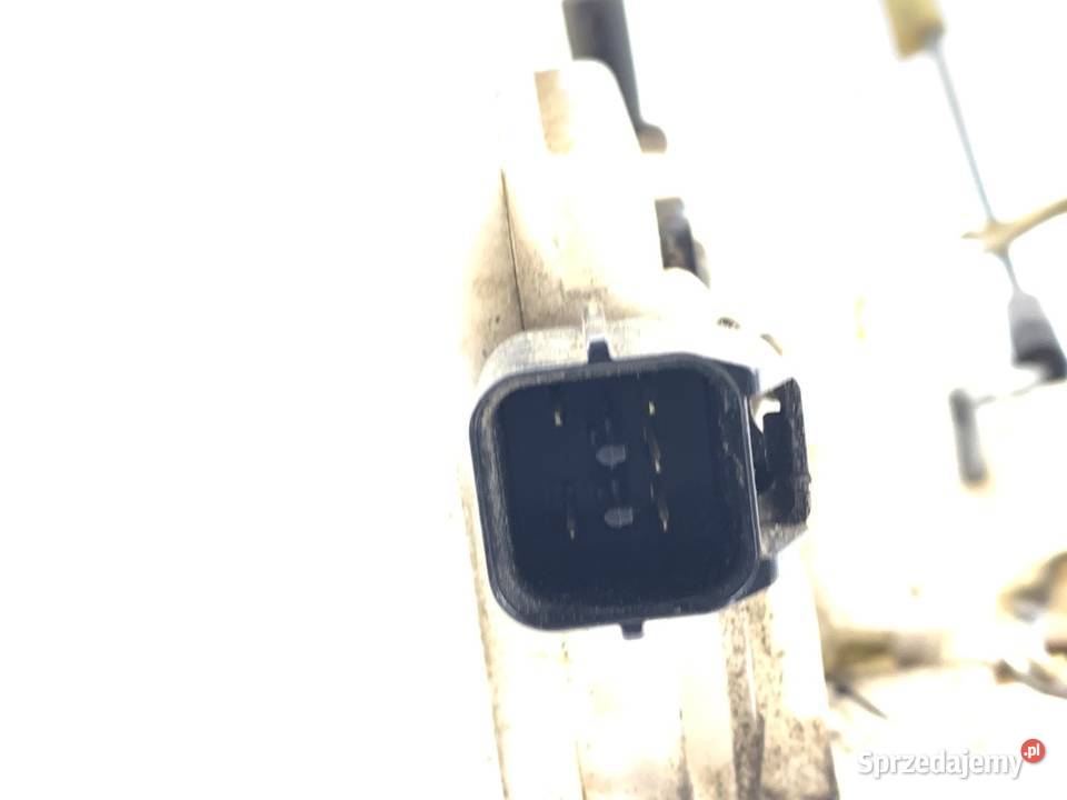 ZAMEK DRZWI LEWY PRZÓD MITSUBISHI OUTLANDER I