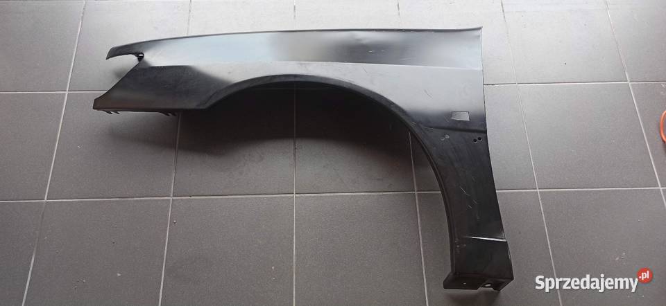 Błotnik LP Peugeot 306 nowy oryginalny sprzedam