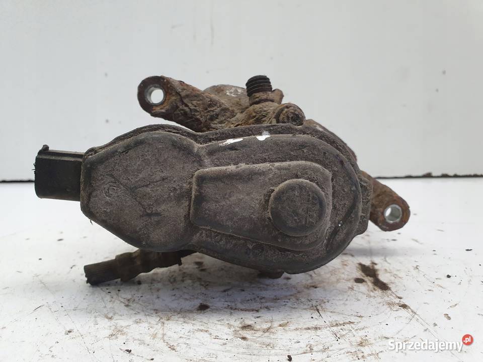 Audi A4 B8 TYLNY ZACISK HAMULCOWY prawy tył Janów