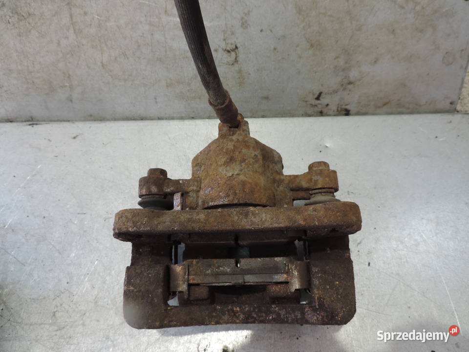 KIA RIO II 0510 ZACISK HAMULCOWY JARZMO LEWY TYŁ małopolskie Nowy Sącz