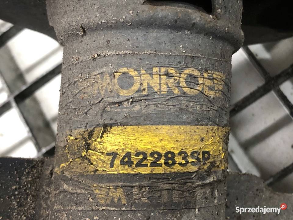 AMORTYZATOR LEWY PRZÓD ZE SPRĘŻYNĄ RENAULT osobowe