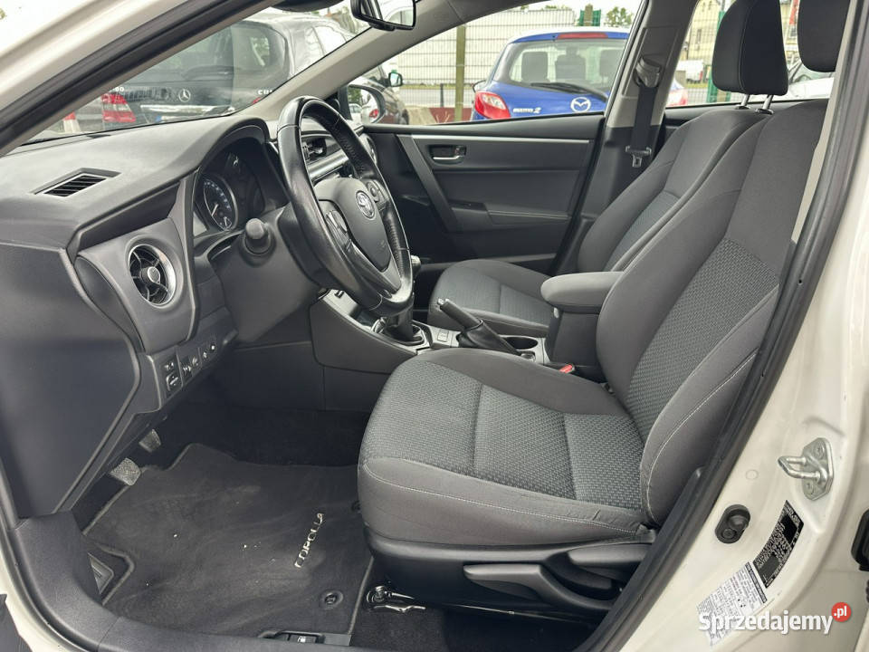 Toyota Corolla 16 benzynaBiała perłaKamera 1598cm3 Warszawa