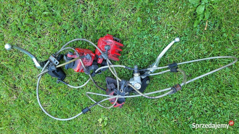 komplet hamulce przedni i tylni pompa dzwignia Piła