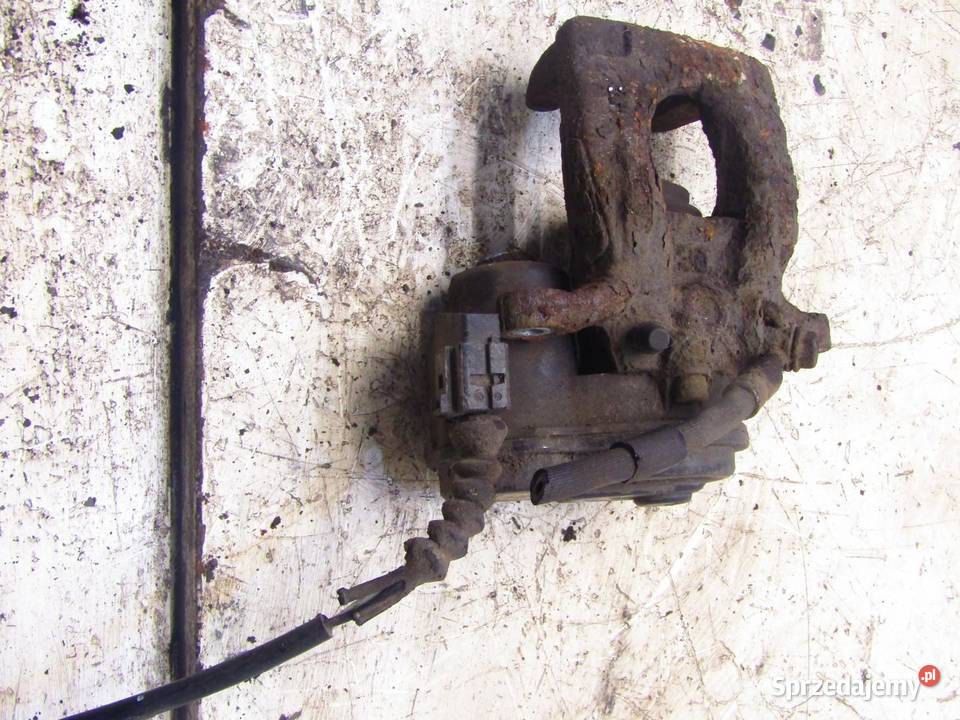 ZACISK HAMULCOWY PRAWY PRAWA TYLNY 16 DCI NISSAN
