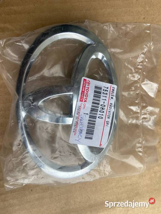 EMBLEMAT ZDERZAKA PRZÓD ZNACZEK LOGO TOYOTA AYGO manualna Aygo Marki