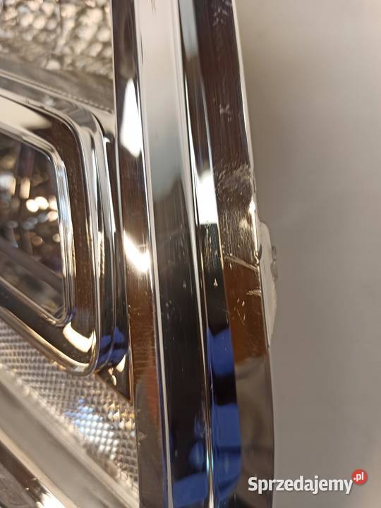 SUZUKI SWIFT MK8 WNĘTRZE RAMKA LAMPY LEWY TYŁ osobowe