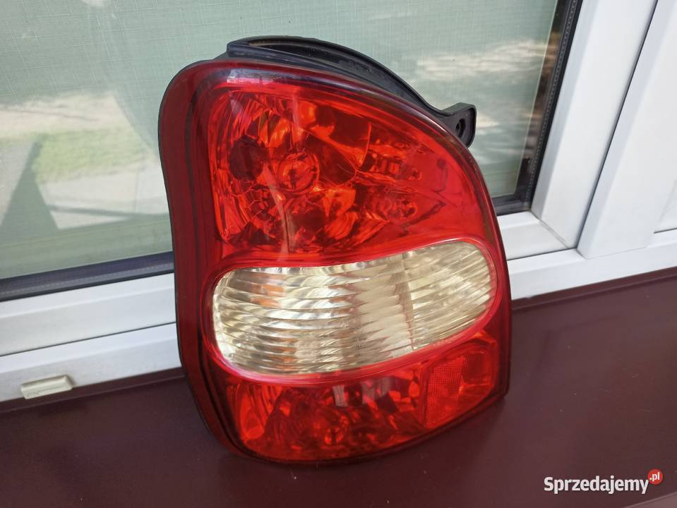 Kia Carnival I 1 lampa tył tylna lewa Sieradz