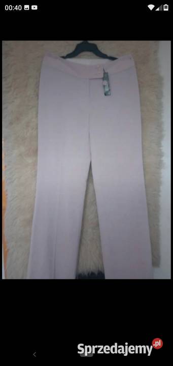 Nowe eleganckie spodnie pudrowy róż szerokie Rozmiar 40(L) Dębica sprzedam