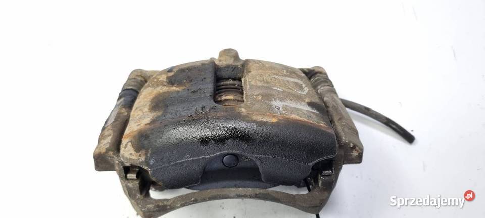 ZACISK HAMULCOWY PRZÓD LEWY VOLKSWAGEN PASSAT B8