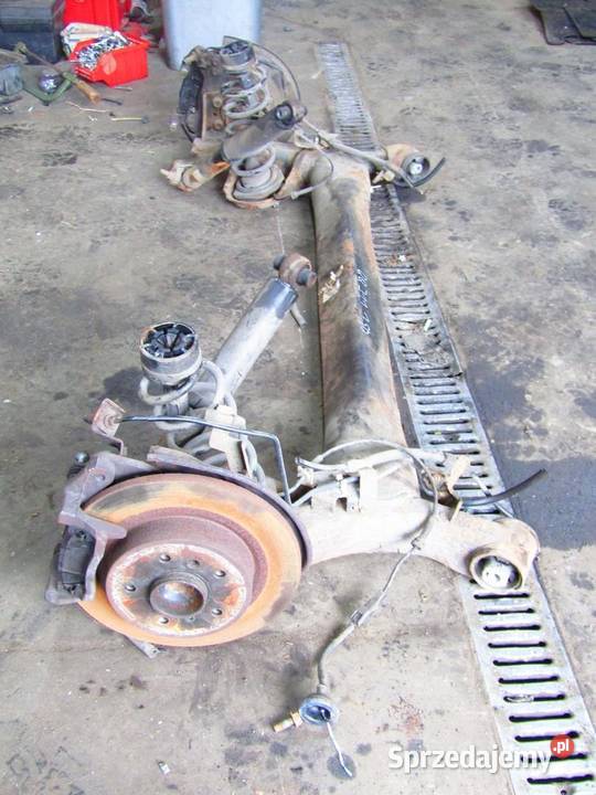 BELKA OŚ ZAWIESZENIA TYŁ TYLNA 12 DIGT NISSAN osobowe