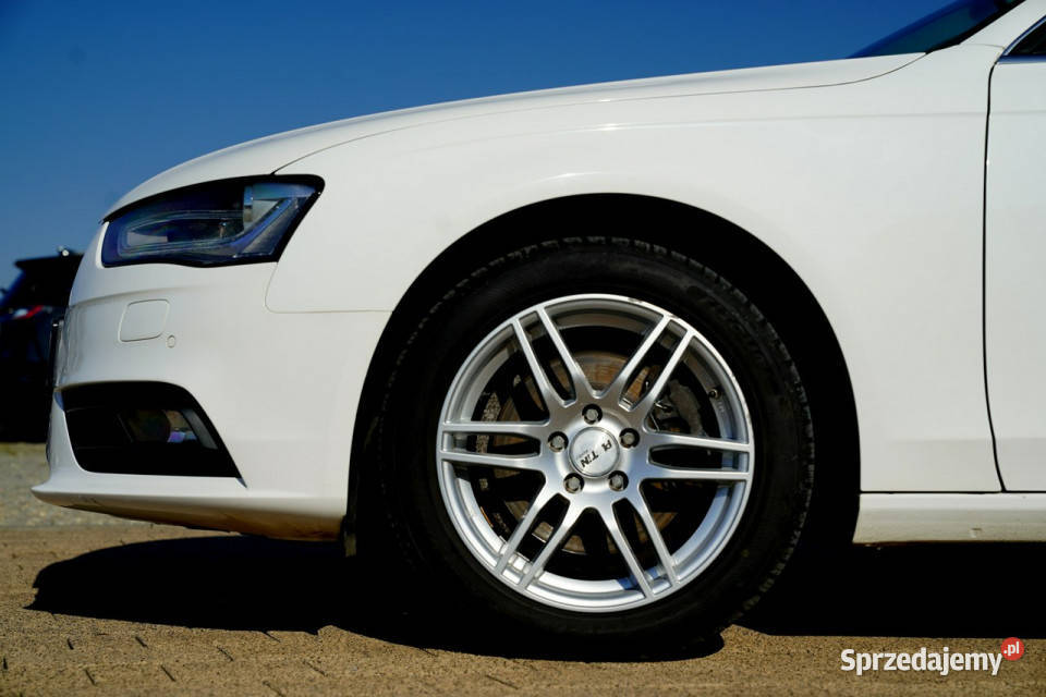 Audi A4 QUATTRO bixenonled NAWI grzane fotele centralny zamek Otmuchów