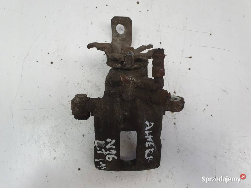 Volvo S40 V40 ZACISK HAMULCOWY Lewy tył kierowcy Rudka