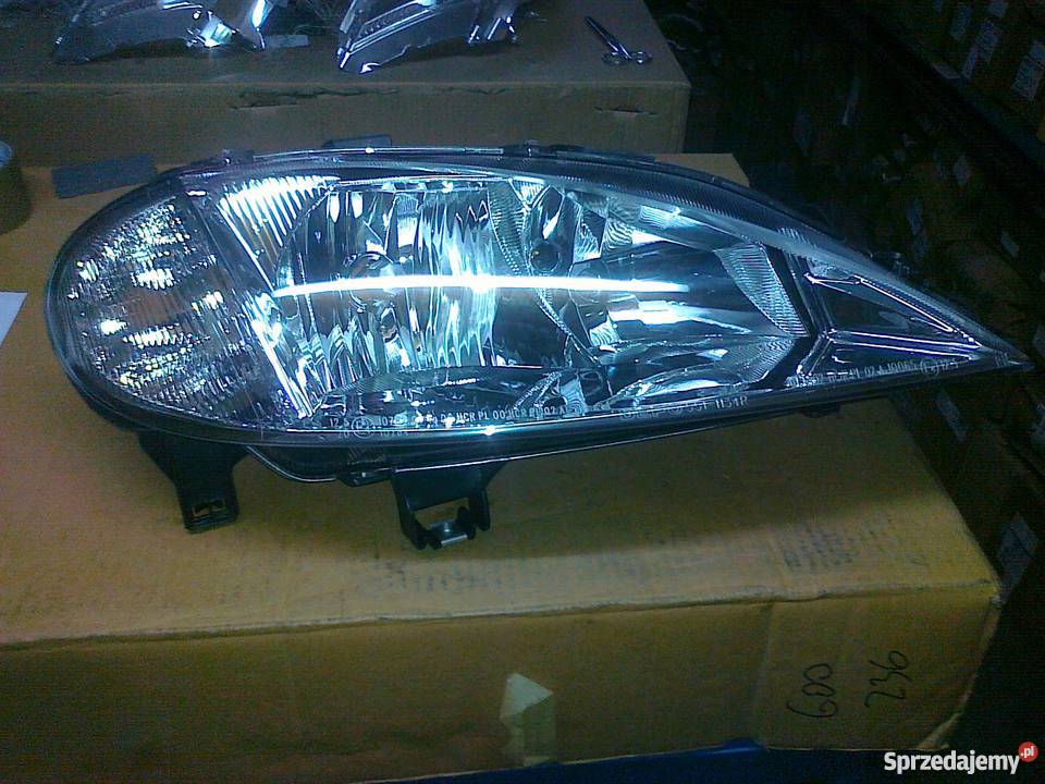 NISSAN ALMERA 20002002 REFLEKTOR H1H7 REG ELE LE Motoryzacja