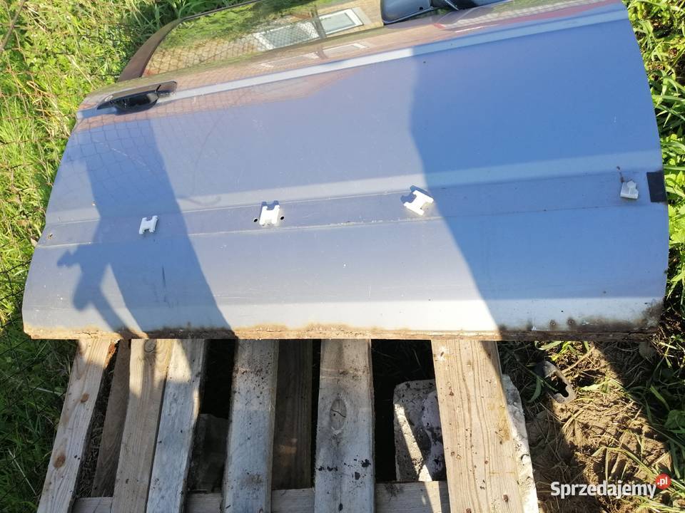 Bmw e32 drzwi przód przednie prawe części blacharskie Drelów