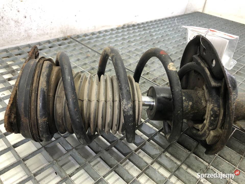 AMORTYZATOR PRAWY PRZÓD ZE SPRĘŻYNĄ RENAULT Amortyzatory