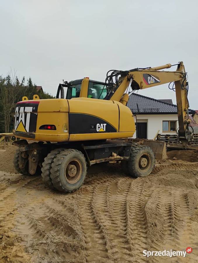 SPRZEDAM KOPARKE KOŁOWA CAT M 316C nie Koparki pomorskie