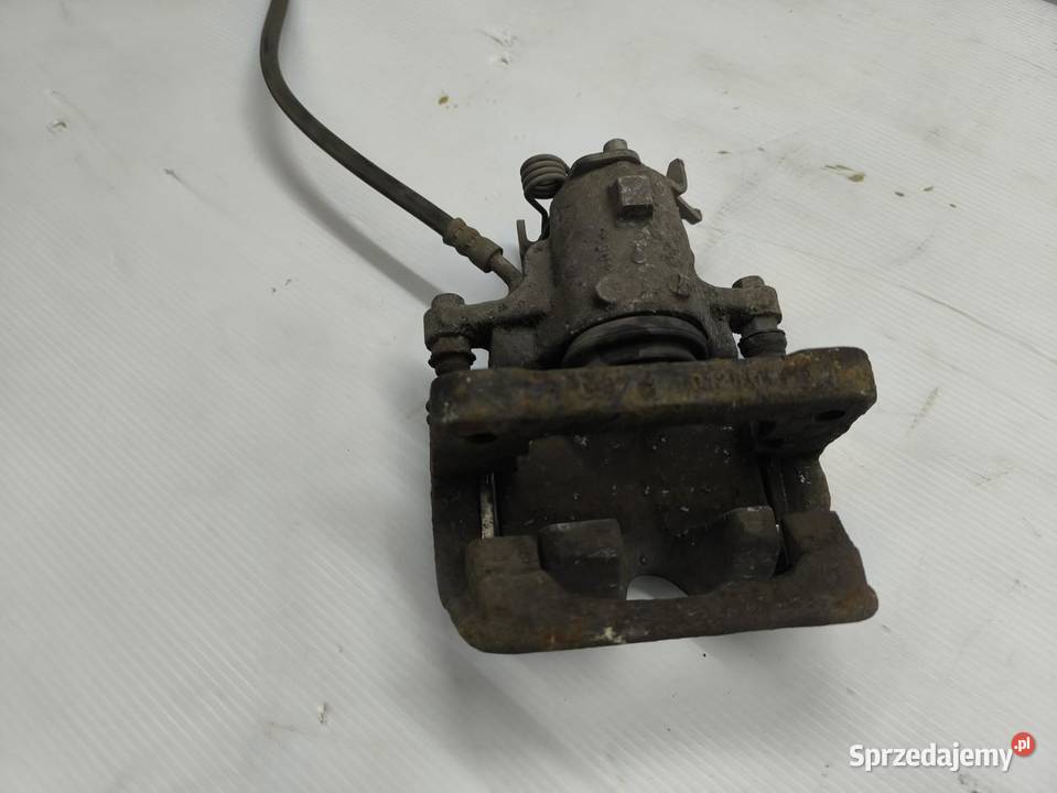 ZACISK HAMULCA LEWY TYŁ OPEL INSIGNIA A 20CDTI