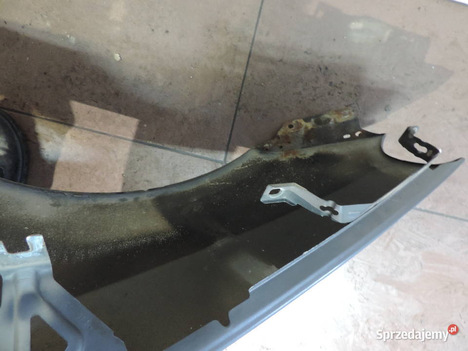 FIAT GRANDE PUNTO BŁOTNIK PRAWY PRZÓD 634C osobowe Nowy Sącz