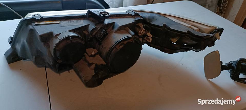 Reflektory i spryskiwacze Xenon Saab 9 5 Lampy przednie sprzedam