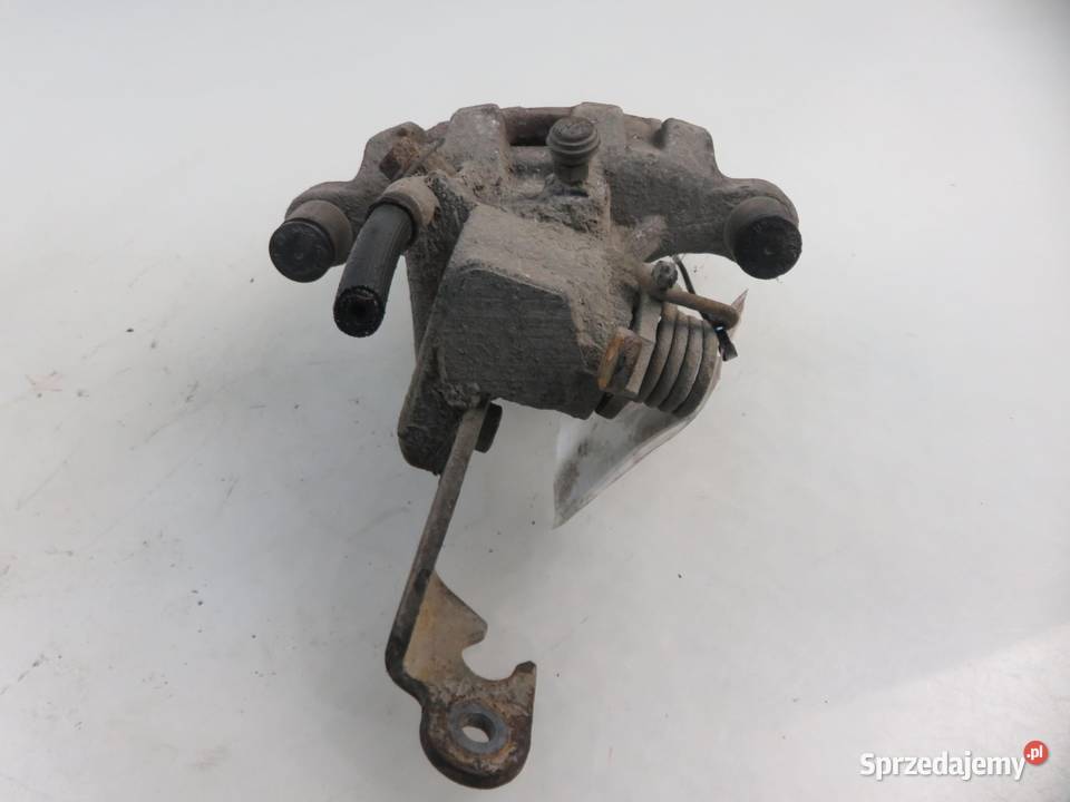 ZACISK LEWY TYŁ NISSAN PRIMERA P12