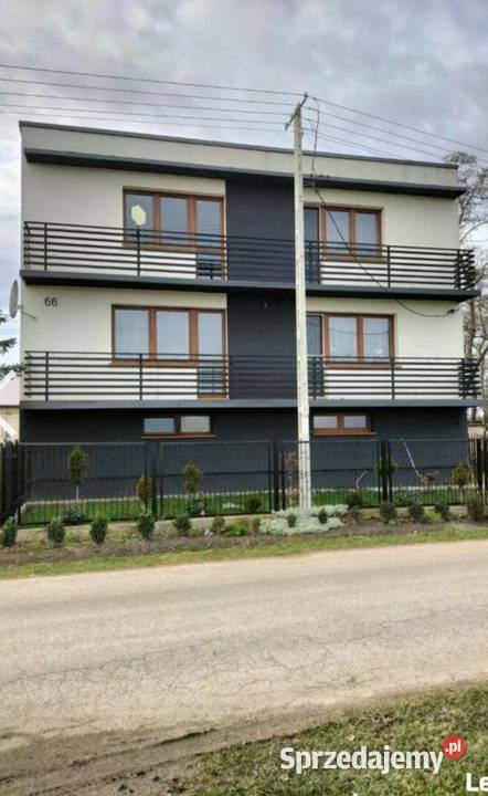 Dom z budynkami gospodarczymi cegła Lubień