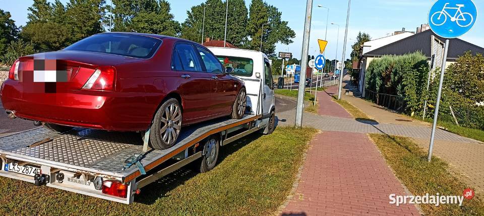 Laweta Transport Maszyn Pojazdów 24h Trawniki