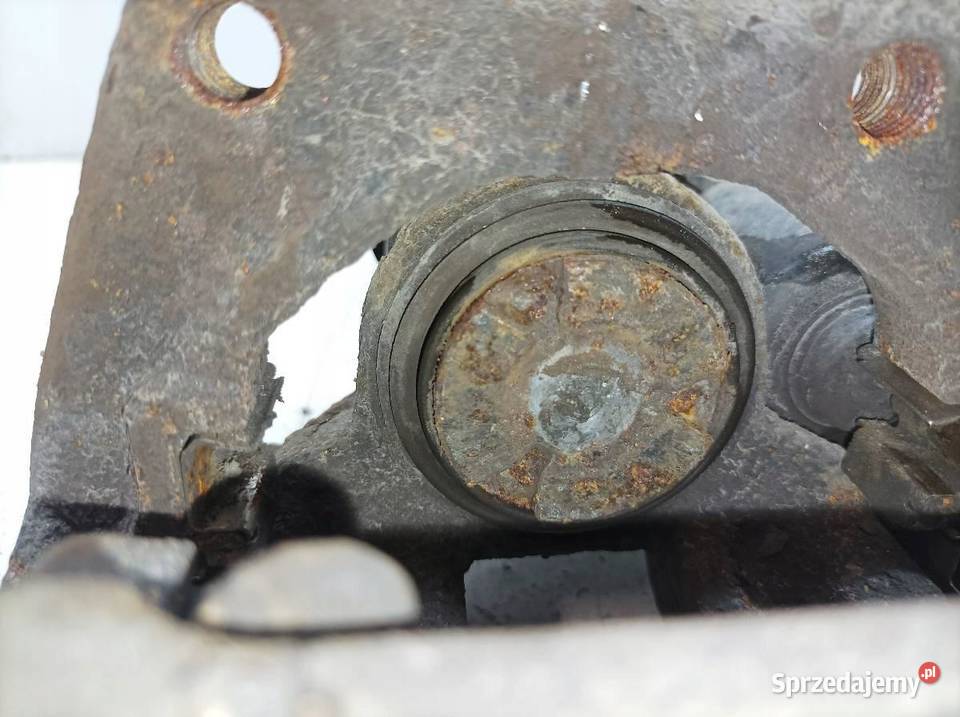 ZACISK HAMULCOWY LEWY TYŁ 20 D ELEKTRYCZNY Bmw osobowe