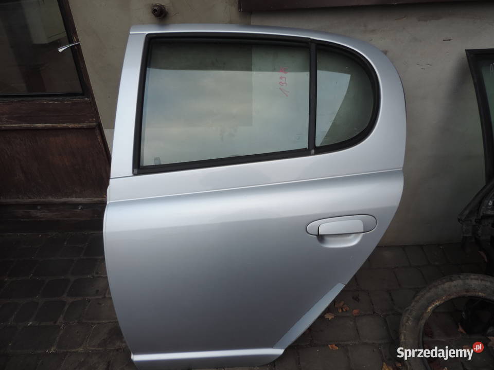 DRZWI LEWY TYŁ TOYOTA YARIS 1 KOLOR 199 Nowy Sącz