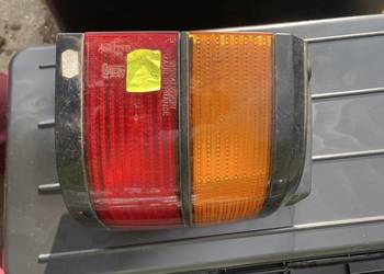 NOWA Lampa Tylna Prawa Błotnik VW Passat B3 Sedan SIGNAL VISION Oryginał VW