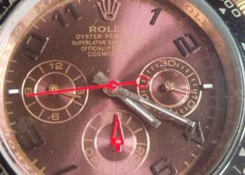 Zegarek Rolex Daytona w złotym kolorze