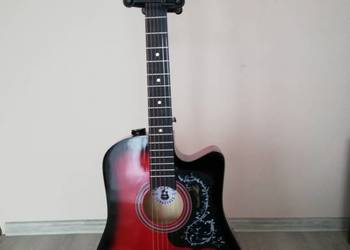Sprzedam nowiutką gitarę akustyczną.
